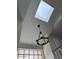 Bright foyer with a skylight and a chandelier at 7800 E Lincoln Dr # 2047, Scottsdale, AZ 85250