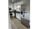 Well-lit kitchen featuring stainless steel appliances and ample counter space at 7800 E Lincoln Dr # 2047, Scottsdale, AZ 85250