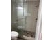 Modern shower with pebble flooring at 7800 E Lincoln Dr # 2047, Scottsdale, AZ 85250