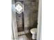 Shower with patterned tile, decorative window, and toilet at 7800 E Lincoln Dr # 2047, Scottsdale, AZ 85250