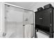 Updated bathroom with a shower, toilet, and a stylish black cabinet at 8500 E Southern Ave # 538, Mesa, AZ 85209