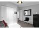 Cozy bedroom featuring double doors and a large mirror at 8500 E Southern Ave # 538, Mesa, AZ 85209