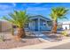 Well maintained mobile home with a desert landscape at 8500 E Southern Ave # 538, Mesa, AZ 85209