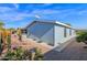 Home exterior showcasing a side view and landscaping at 8500 E Southern Ave # 538, Mesa, AZ 85209