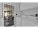 Practical laundry room with washer, dryer, and exterior access at 8500 E Southern Ave # 538, Mesa, AZ 85209