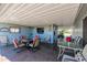 Outdoor patio includes seating area and golf cart access at 8500 E Southern Ave # 538, Mesa, AZ 85209