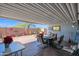 Relaxing covered patio boasts seating for dining and lounging at 8500 E Southern Ave # 538, Mesa, AZ 85209