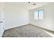 Spacious bedroom featuring neutral wall paint and carpeting at 10073 W Mission Dr, Arizona City, AZ 85123