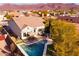 Single-story home with pool and mountain views at 10283 E Fortuna Ave, Gold Canyon, AZ 85118