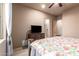 Bedroom with en-suite bathroom and wood furniture at 10283 E Fortuna Ave, Gold Canyon, AZ 85118