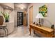 Bright and airy entryway with wood accents at 10283 E Fortuna Ave, Gold Canyon, AZ 85118