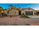 House exterior with palm trees and gravel driveway at 10283 E Fortuna Ave, Gold Canyon, AZ 85118