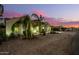 Beautiful house exterior at dusk with desert landscaping at 10283 E Fortuna Ave, Gold Canyon, AZ 85118