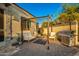 Covered patio with comfortable seating and a built-in grill, ideal for al fresco dining at 10283 E Fortuna Ave, Gold Canyon, AZ 85118