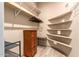 Spacious walk-in closet with ample shelving and hanging space at 10283 E Fortuna Ave, Gold Canyon, AZ 85118