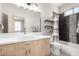 Modern bathroom with updated vanity, shower, and tile at 11065 E Mark Ln, Scottsdale, AZ 85262