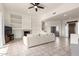 Living room with fireplace, built-ins and view of backyard at 11065 E Mark Ln, Scottsdale, AZ 85262