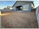 Large backyard with dirt and footprints, new construction home at 11446 E Utah Ave, Mesa, AZ 85212