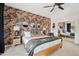 Bedroom with brown leather bed frame and fern wallpaper at 13231 N El Pueblo Blvd, Fountain Hills, AZ 85268