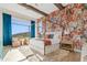 Spacious main bedroom with a four poster bed and a floral accent wall at 13231 N El Pueblo Blvd, Fountain Hills, AZ 85268