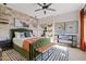 Bright bedroom with a green velvet bed and patterned rug at 13231 N El Pueblo Blvd, Fountain Hills, AZ 85268