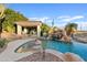 Spacious pool area with waterfall, gazebo and lounge chairs at 13231 N El Pueblo Blvd, Fountain Hills, AZ 85268