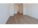 Clean and bright hallway with wood-look tile floors at 1357 E Cherrywood Pl, Chandler, AZ 85249