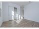 Bedroom with wood-look floors and sliding closet doors at 1364 E Nolan Pl, Chandler, AZ 85249