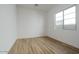 Simple bedroom with a window and tile floors at 1364 E Nolan Pl, Chandler, AZ 85249