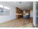 Modern kitchen with wood cabinets, large island, and tile flooring at 1364 E Nolan Pl, Chandler, AZ 85249