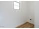 Bright laundry room with tile floors and window at 1364 E Nolan Pl, Chandler, AZ 85249