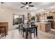 Kitchen with granite countertops, wood cabinets, and stainless steel appliances at 14570 N 142Nd Ln, Surprise, AZ 85379