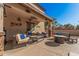 Relaxing patio furniture and fire pit area at 14570 N 142Nd Ln, Surprise, AZ 85379