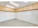 Unfinished basement with overhead storage at 14614 N 153Rd Ct, Surprise, AZ 85379