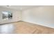 Living room featuring hardwood and tile flooring, and a window at 14614 N 153Rd Ct, Surprise, AZ 85379