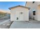 Tan storage shed with double doors and a pet door at 14614 N 153Rd Ct, Surprise, AZ 85379