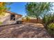 Spacious backyard with gravel landscaping and shed at 1502 E Angela Dr, Phoenix, AZ 85022