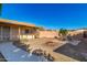 Backyard patio with firepit and seating area at 1502 E Angela Dr, Phoenix, AZ 85022