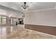 Dining area with tile floors and decorative chandelier at 1502 E Angela Dr, Phoenix, AZ 85022