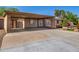 House exterior with covered carport and landscaping at 1502 E Angela Dr, Phoenix, AZ 85022