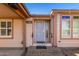 Home's front entrance with security door and brick walkway at 1502 E Angela Dr, Phoenix, AZ 85022