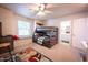 bedroom with a bunk bed, window seat, and ensuite bathroom at 15021 N 19Th Way, Phoenix, AZ 85022