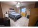 Bright bedroom with tiled floors and a ceiling fan at 15021 N 19Th Way, Phoenix, AZ 85022