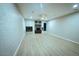 Spacious living room featuring a fireplace and wood-look floors at 15021 N 19Th Way, Phoenix, AZ 85022