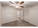 Bedroom with ceiling fan and double door closet at 1511 W El Monte Pl, Chandler, AZ 85224