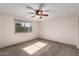 Bedroom with ceiling fan and carpeted floors at 1511 W El Monte Pl, Chandler, AZ 85224