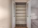 Shelved closet with bi-fold doors at 1511 W El Monte Pl, Chandler, AZ 85224