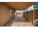 Covered patio area with access to backyard at 1511 W El Monte Pl, Chandler, AZ 85224