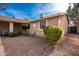 Side view of a house showing a covered patio and landscaping at 1511 W El Monte Pl, Chandler, AZ 85224