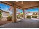 Covered patio with brick columns and comfortable seating at 1511 W El Monte Pl, Chandler, AZ 85224